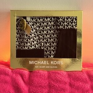 Micheal Kors scarf gloves and hat set 
Originally $148